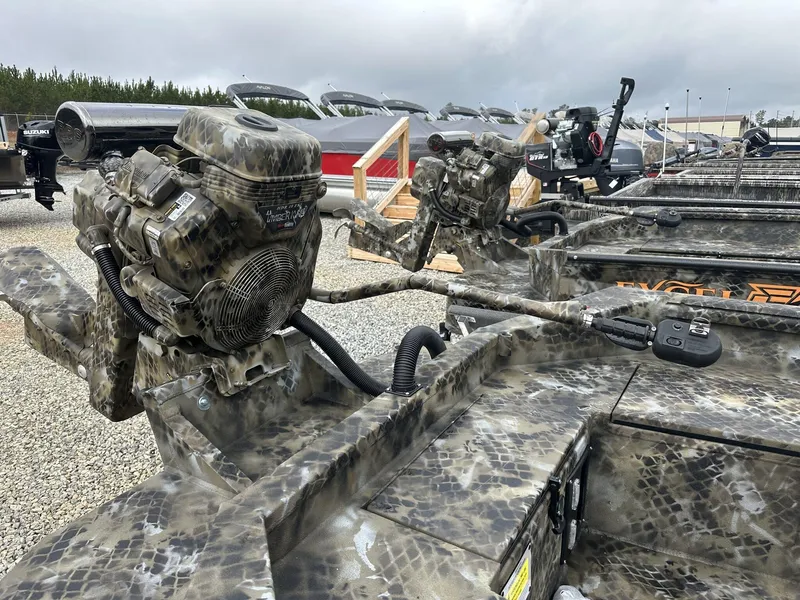 Slide: The Image of Camouflage-patterned Excel Shallow Water F4 1754 F86 HDR5000 boats with powerful engines, 2025 model. - 8