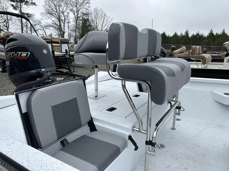 Slide: The Image of 2025 Xpress Hyper-Lift Series H22B boat interior with Yamaha SHO engine and seating. - 13