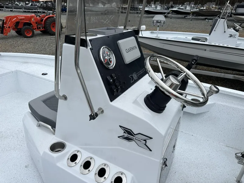 Slide: The Image of 2025 Xpress Hyper-Lift Series H22B boat console with Garmin navigation system. - 8