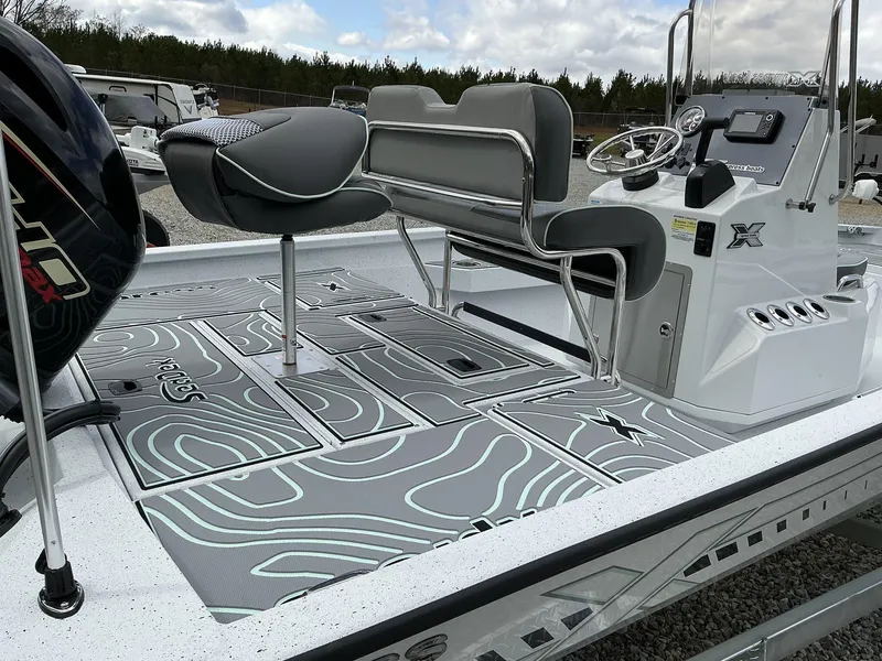 Slide: The Image of 2025 Xpress Hyper-Lift Series H20B boat with new console, sleek design, and modern seating. - 7