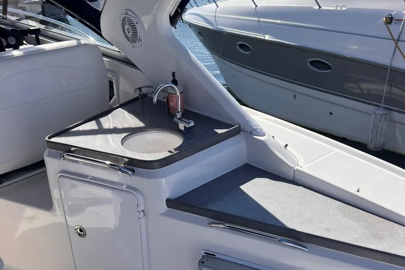 Slide: The Image of 2006 Regal 3360 Window Express boat interior with sink and countertop. - 26