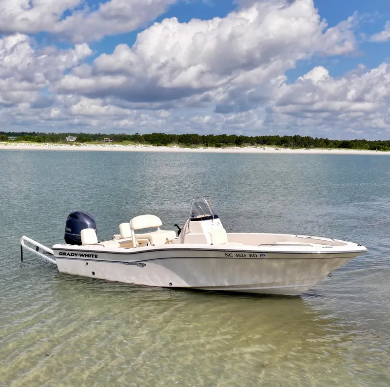 The Image of 2016 Grady-White 191 Coastal Explorer boat on calm water under a cloudy sky. - 0