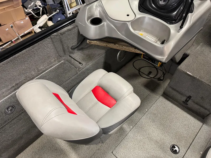Slide: The Image of 2014 Tracker Pro Guide V-175 WT boat interior with gray and red seating. - 10