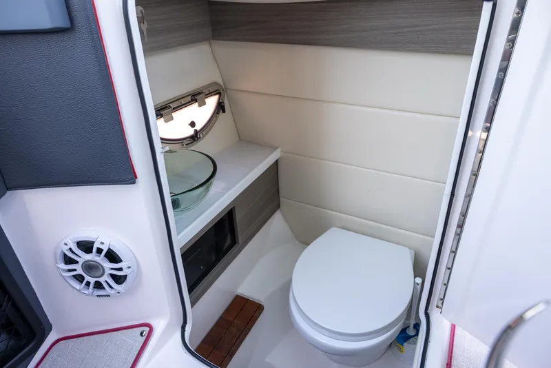 Slide: The Image of 2020 Regal 29 OBX boat interior with modern bathroom amenities. - 14