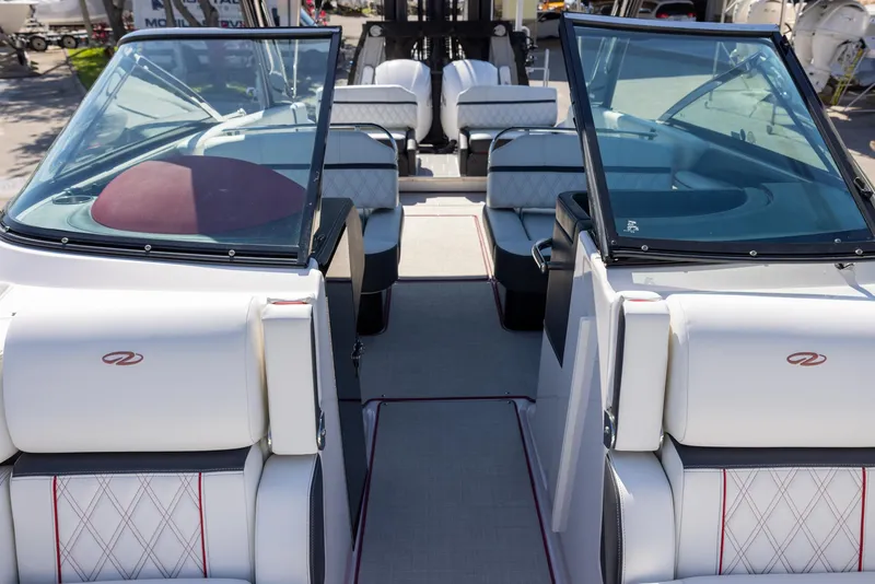 Slide: The Image of 2020 Regal 29 OBX boat interior with luxurious seating and modern design. - 17