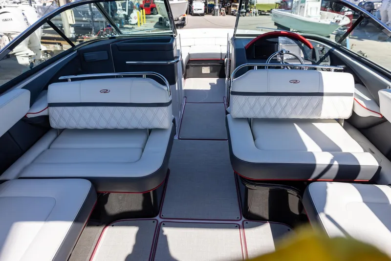 Slide: The Image of Interior of 2020 Regal 29 OBX boat with luxurious seating and modern design. - 18