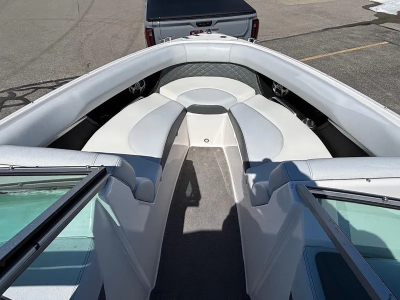 Slide: The Image of 2013 Regal 2300 Bowrider boat interior with spacious seating and modern design. - 21