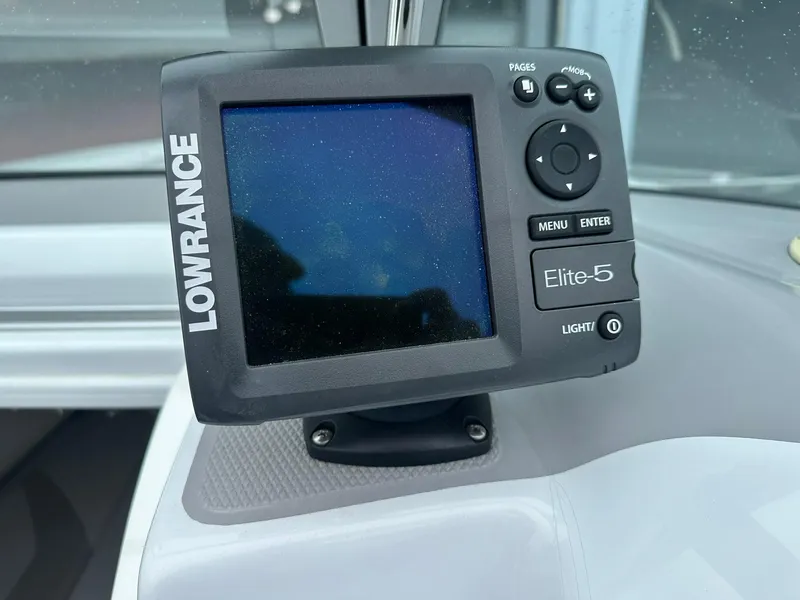 Slide: The Image of Lowrance Elite-5 fishfinder on 2005 Baja 245 Performance boat dashboard. - 20
