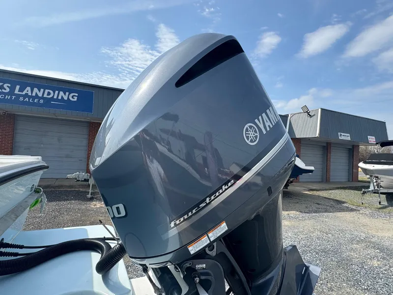 Slide: The Image of Yamaha outboard motor on a 2017 Steiger Craft 255 DV Chesapeake boat at a sales lot. - 16