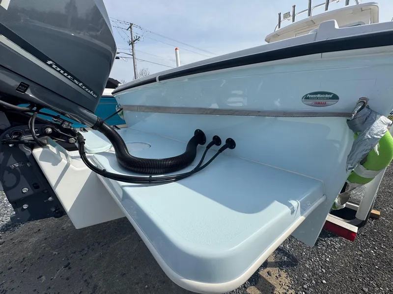 Slide: The Image of 2017 Steiger Craft 255 DV Chesapeake boat stern with motor and cables. - 17
