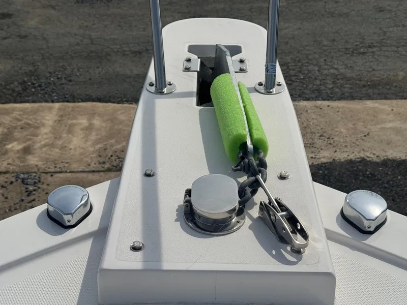 Slide: The Image of Bow of 2017 Steiger Craft 255 DV Chesapeake with anchor and green buoy. - 25