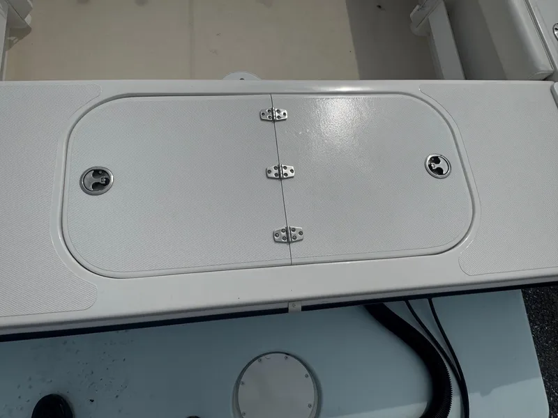 Slide: The Image of 2017 Steiger Craft 255 DV Chesapeake boat deck hatch with secure latches. - 26