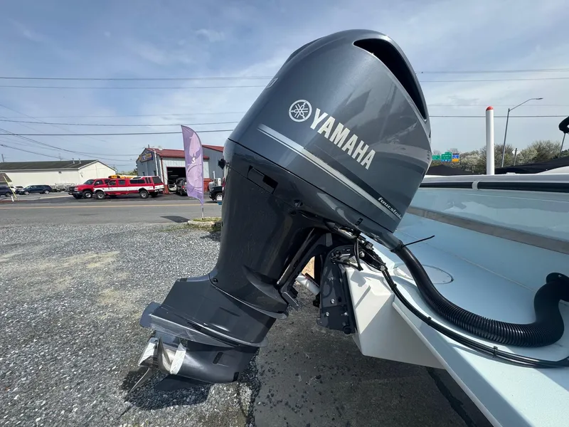 Slide: The Image of 2017 Steiger Craft 255 DV Chesapeake with Yamaha outboard motor, parked outdoors. - 5