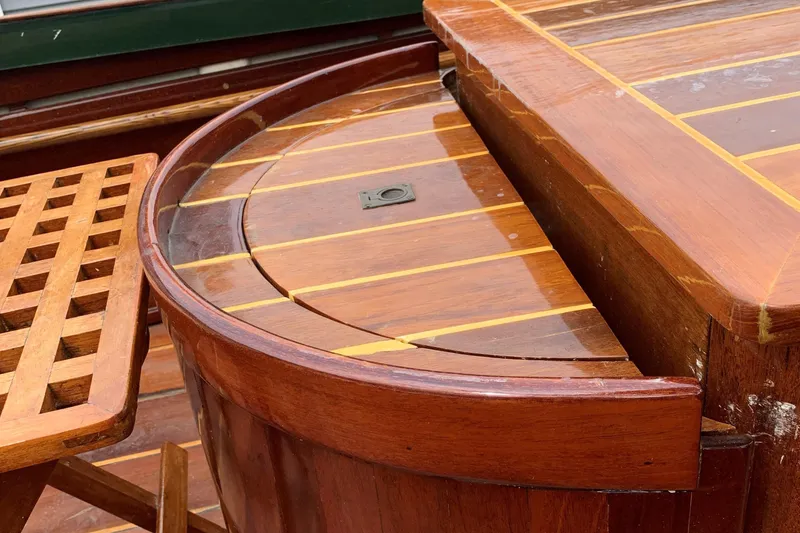 Slide: The Image of Polished wood deck of 1990 Classic English Launch boat with intricate detailing. - 30