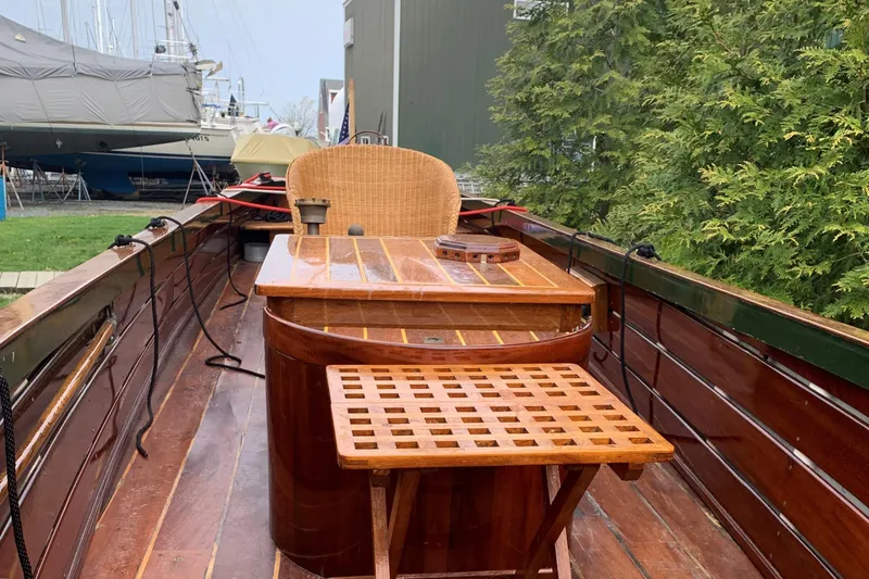 Slide: The Image of Classic English Launch boat interior with wooden seating and table, 1990 model. - 32