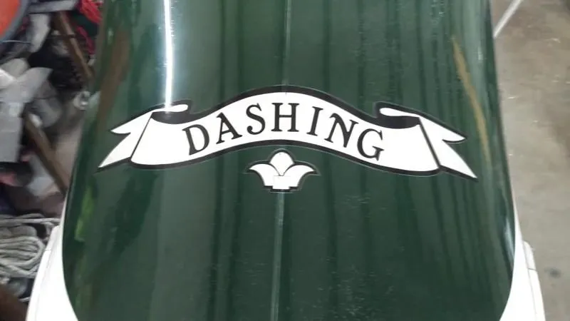 Slide: The Image of Green boat with "Dashing" banner, Classic English Launch, 1990 model. - 8