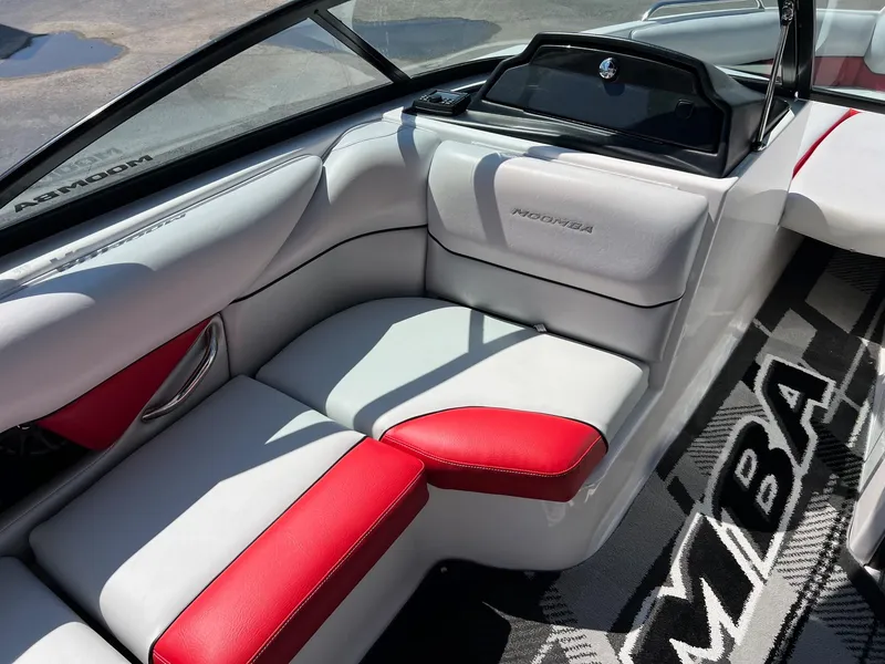 Slide: The Image of 2013 Moomba Mojo 2.5 boat interior with red and white seating. - 11