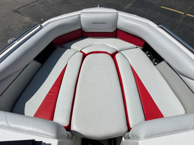 Slide: The Image of 2013 Moomba Mojo 2.5 boat interior with red and white seating. - 15