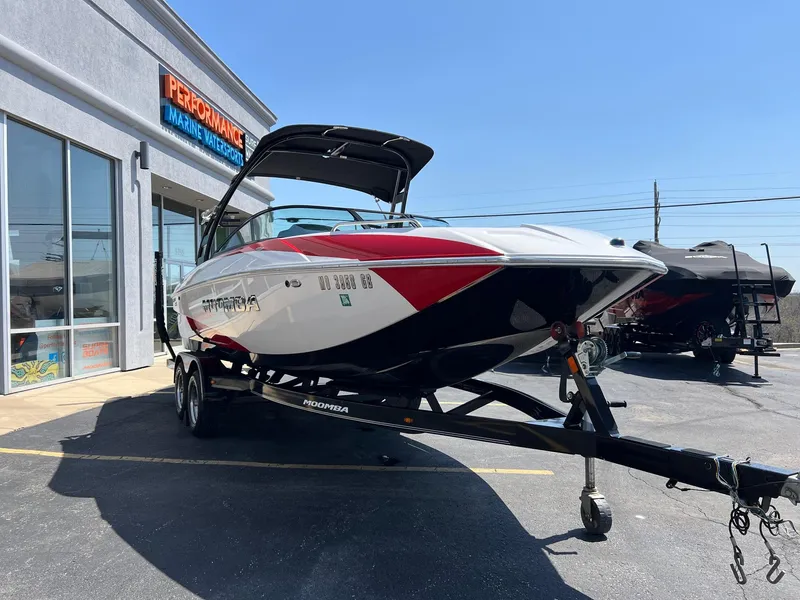 Slide: The Image of 2013 Moomba Mojo 2.5 boat on trailer outside dealership. - 9