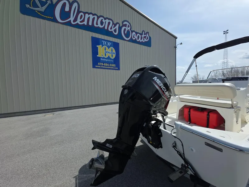 Slide: The Image of 2024 Boston Whaler 150 Montauk with Mercury engine at Clemons Boats dealership. - 5