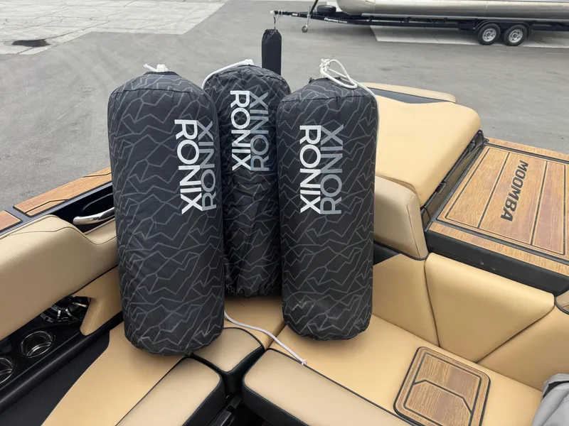 Slide: The Image of 2022 Moomba Makai boat interior with Ronix branded gear on seats. - 17