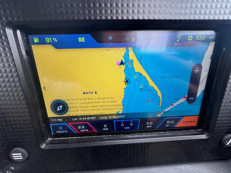 Slide: The Image of 2022 Moomba Makai boat navigation screen displaying map and coordinates. - 21