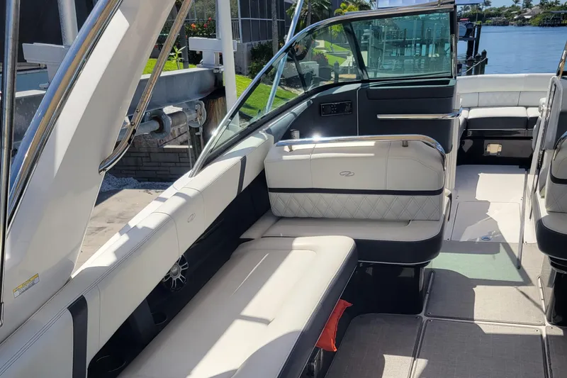 Slide: The Image of 2020 Regal 29 OBX boat interior with luxurious seating and modern design. - 7