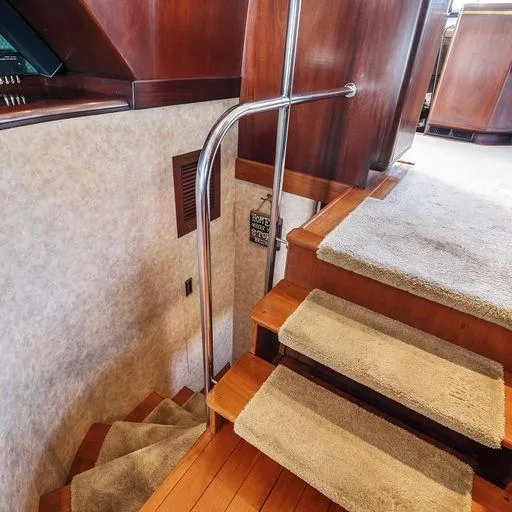 Slide: The Image of Staircase inside 1991 Vic Franck 65 Motor Yacht with wooden steps and carpet runners. - 43