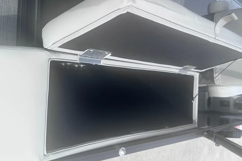 Slide: The Image of Open storage compartment in 2025 Sylvan Mirage X X5 CLZ DH boat. - 16