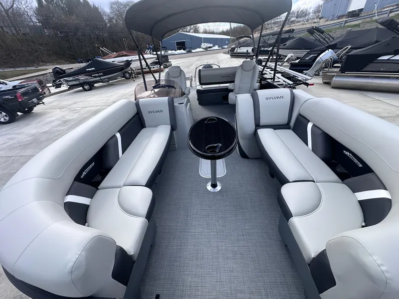 Slide: The Image of 2025 Sylvan Mirage X X5 CLZ DH pontoon boat with spacious seating and modern design. - 5