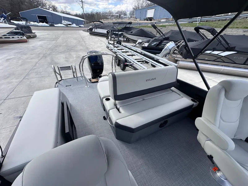 Slide: The Image of 2025 Sylvan Mirage X X5 CLZ DH pontoon boat with spacious seating and modern design. - 8