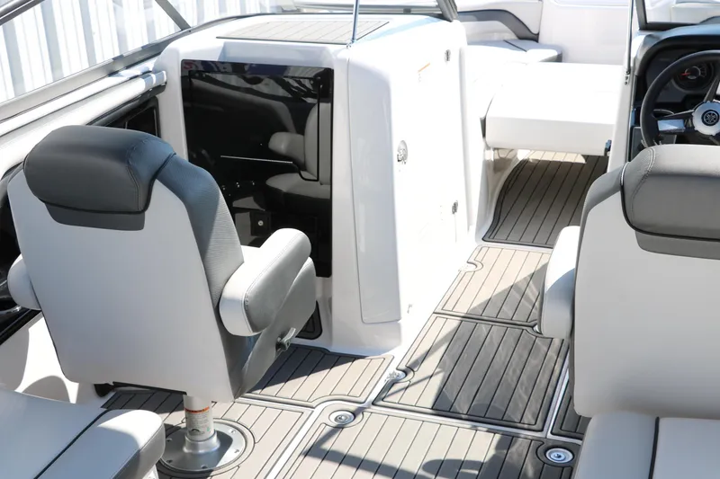 Slide: The Image of 2018 Yamaha Boats AR240 HO interior with sleek seating and modern design. - 17