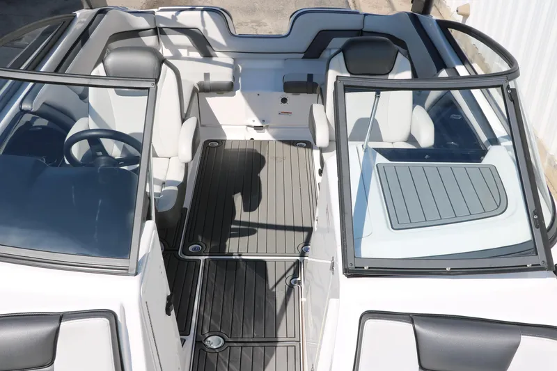 Slide: The Image of 2018 Yamaha Boats AR240 HO interior with sleek seating and modern design. - 20