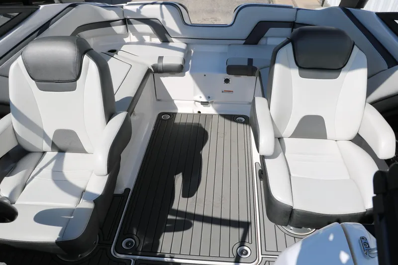 Slide: The Image of 2018 Yamaha Boats AR240 HO interior with two-tone seating and spacious layout. - 30