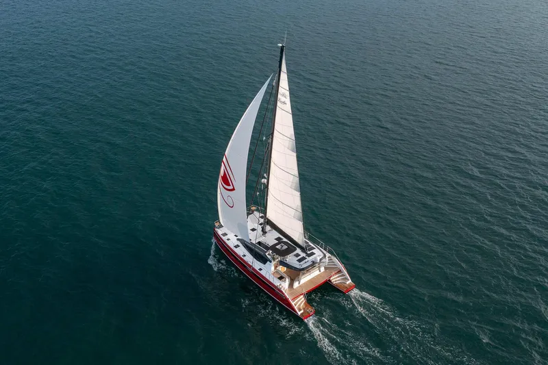 Slide: The Image of Luxury Privilege Signature 510 catamaran sailing on open sea, 2025 model. - 10