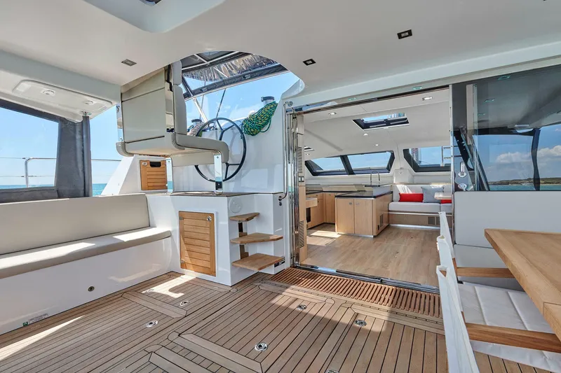 Slide: The Image of Luxurious 2025 Privilege Signature 510 yacht interior with modern design and spacious seating. - 19