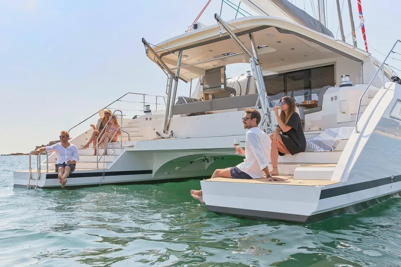 Slide: The Image of People relaxing on a 2025 Privilege Signature 510 yacht in sunny weather. - 26