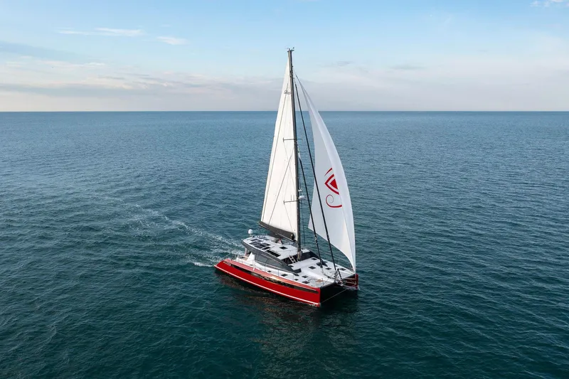 Slide: The Image of Sailing catamaran Privilege Signature 510, 2025 model, cruising on open sea. - 27