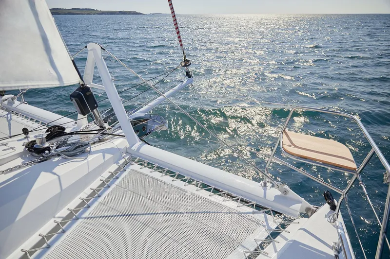 Slide: The Image of Sailing on a 2025 Privilege Signature 510 catamaran, glistening ocean view. - 29