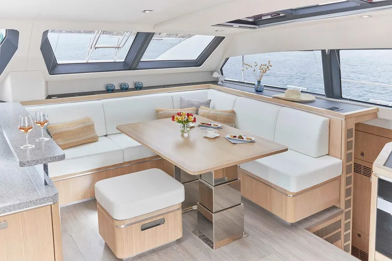 Slide: The Image of Luxurious interior of 2025 Privilege Signature 510 yacht with elegant dining area. - 31