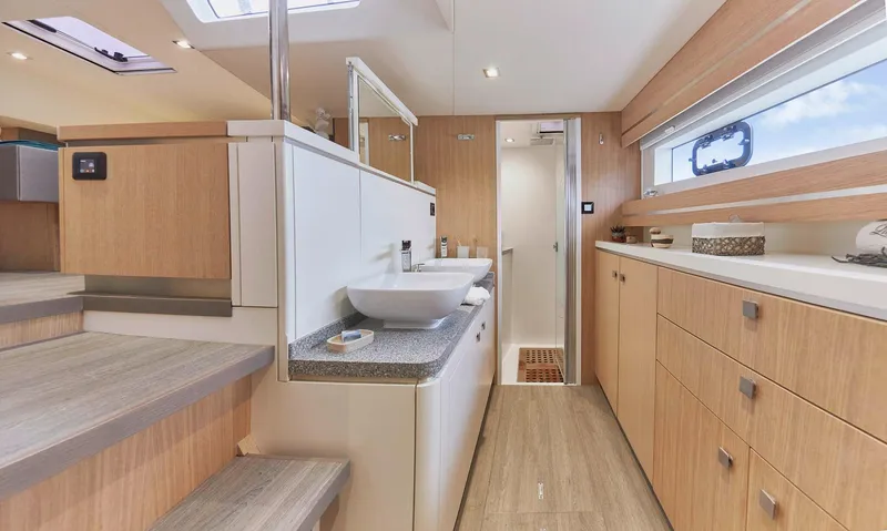 Slide: The Image of Luxurious interior of 2025 Privilege Signature 510 yacht with modern bathroom design. - 39