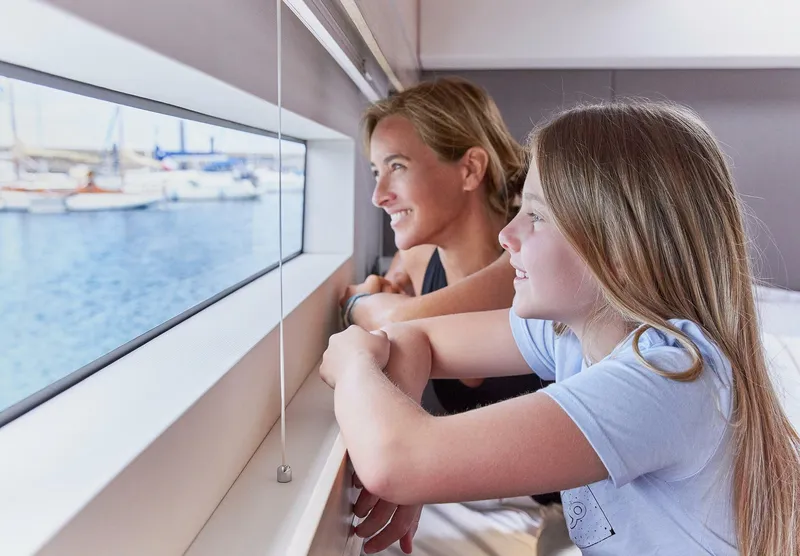 Slide: The Image of Mother and daughter enjoying sea view from Privilege Signature 510 yacht, 2025 model. - 46
