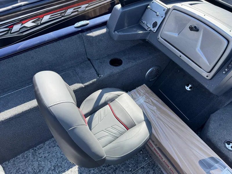 Slide: The Image of 2025 Tracker Pro Guide V-175 WT boat interior with gray seating and dashboard. - 10