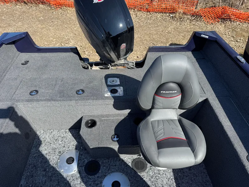 Slide: The Image of 2025 Tracker Pro Guide V-175 WT boat interior with seating and motor. - 16
