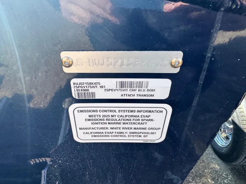 Slide: The Image of 2025 Tracker Pro Guide V-175 WT emissions control and identification labels. - 18