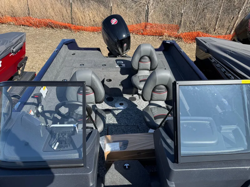 Slide: The Image of 2025 Tracker Pro Guide V-175 WT boat interior with seating and windshield. - 4