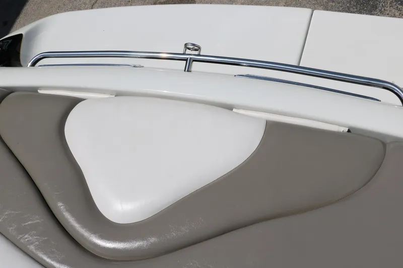 Slide: The Image of 2001 Crownline 225 BR boat interior with beige and white seating. - 28