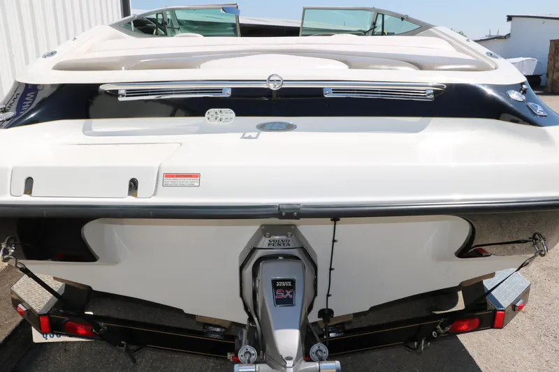 Slide: The Image of 2001 Crownline 225 BR boat rear view with outboard motor. - 6