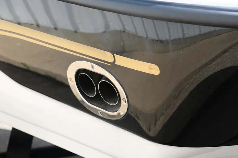 Slide: The Image of Close-up of a 2001 Crownline 225 BR boat exhaust pipes and sleek design. - 8