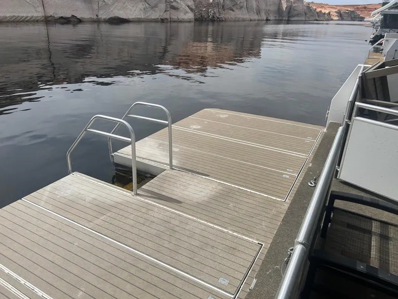 Slide: The Image of Dock with ladder on calm water, Adonia Traditions 6 shares, 2020 model. - 10